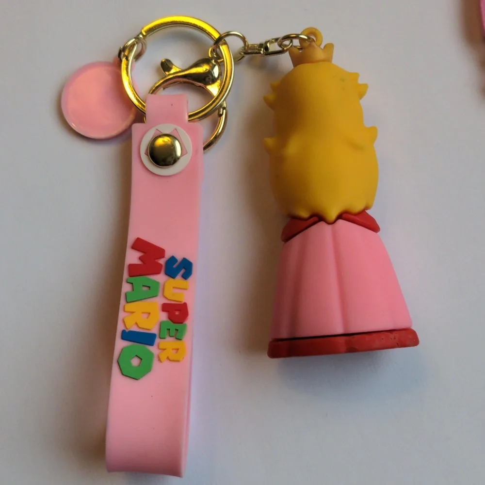 Pink Princess Peach Keychain Set  & Justice Metal keychain. Purse Fobs. New,